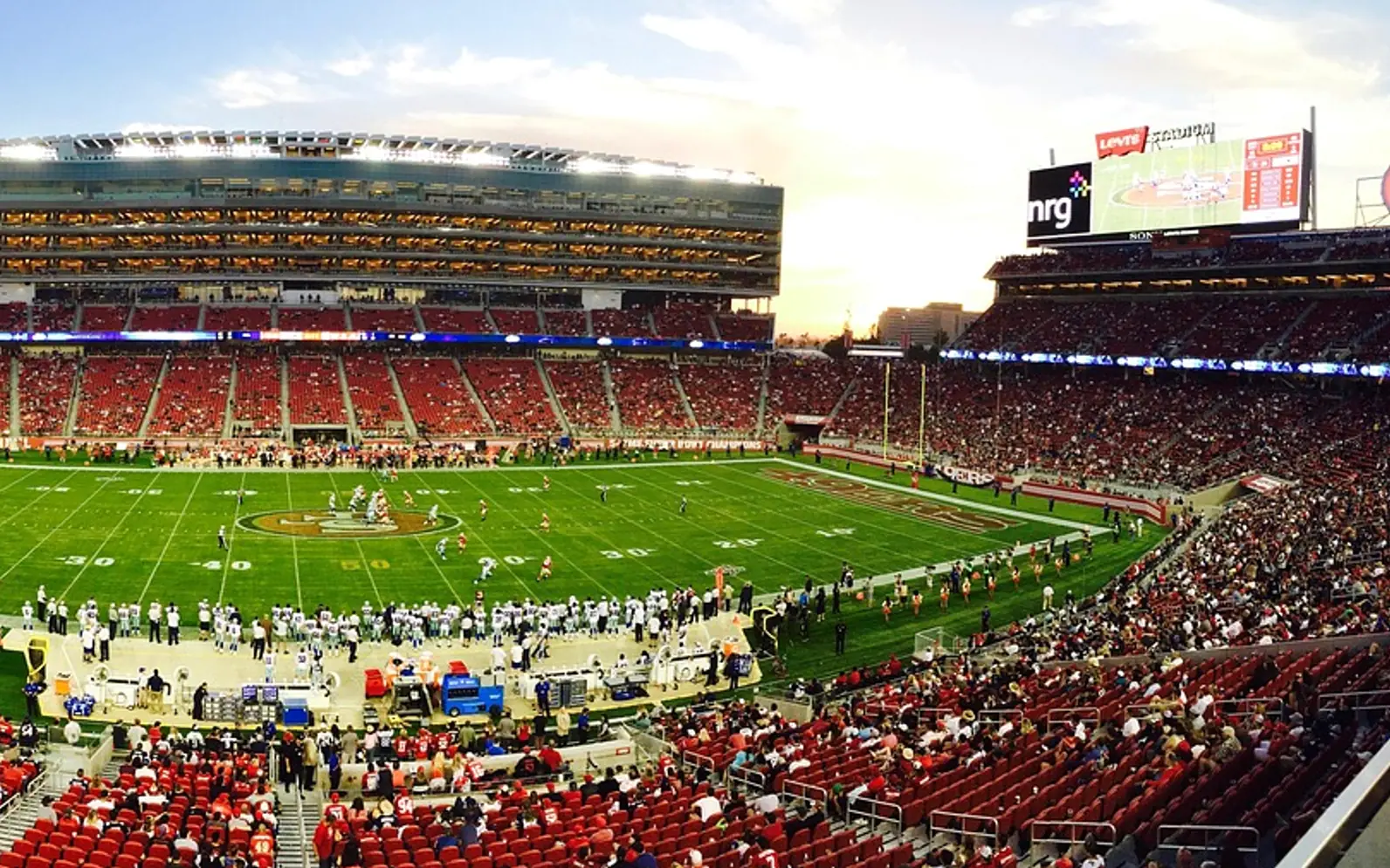 Athletes, stadium and crowd